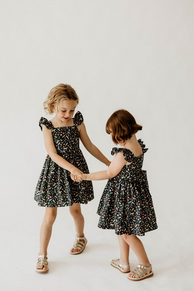 Girl’s Navy Christmas Print Flutter Sleeve Dress
