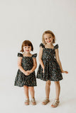 Girl’s Navy Christmas Print Flutter Sleeve Dress