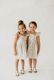 Girl’s White Christmas Print Flutter Sleeve Dress