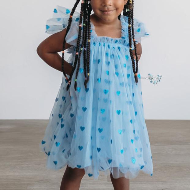 little girls blue tulle dress with sparkly blue hearts