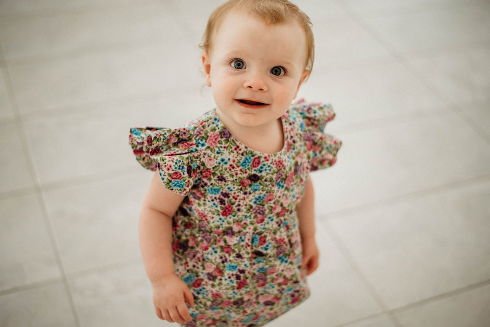 infant girls purple ditsy calico floral print romper