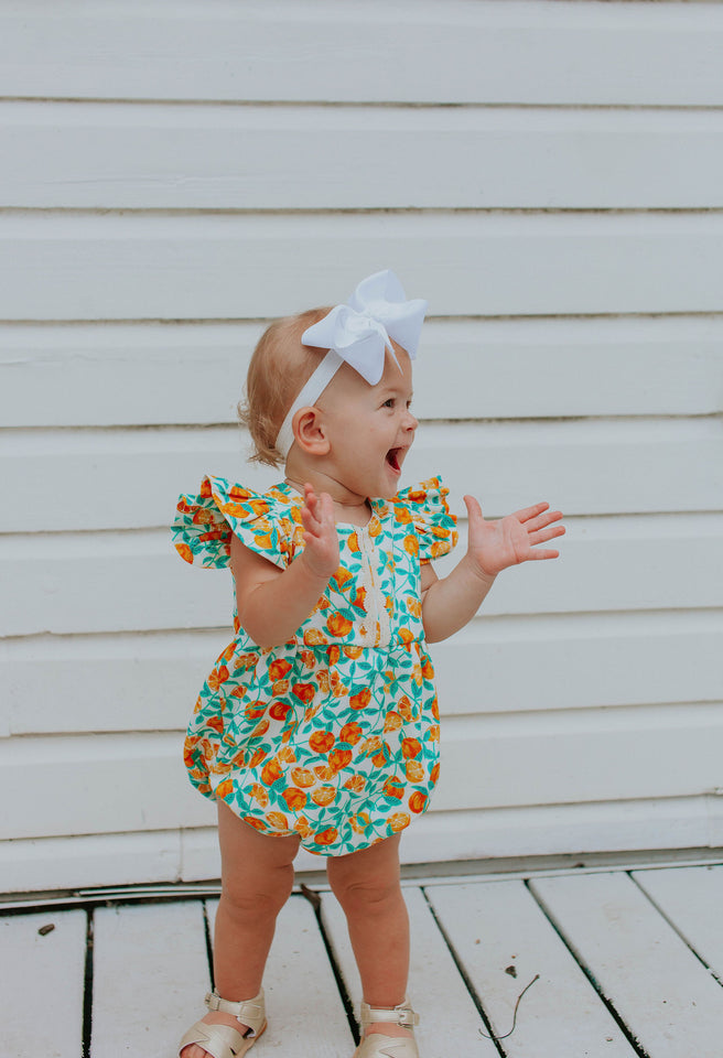 orange print bubble romper for baby