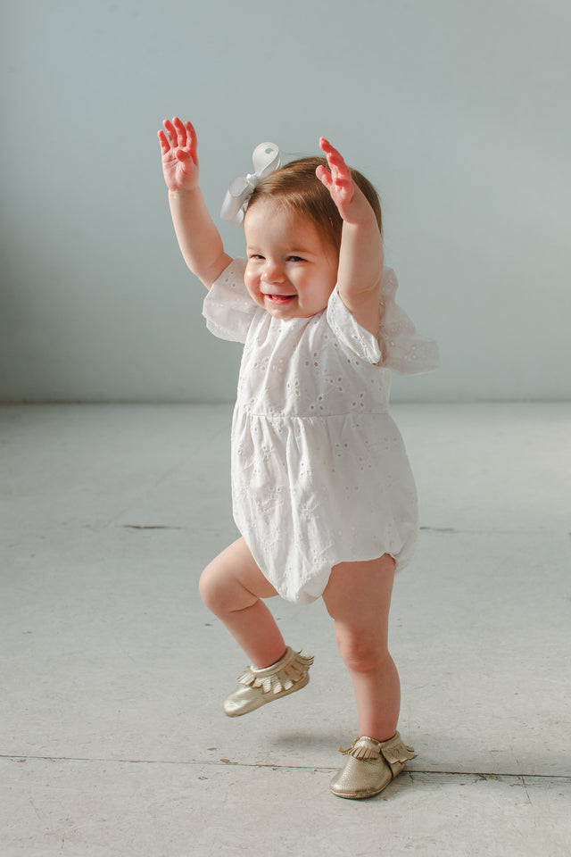 baby girl's white eyelet bubble romper
