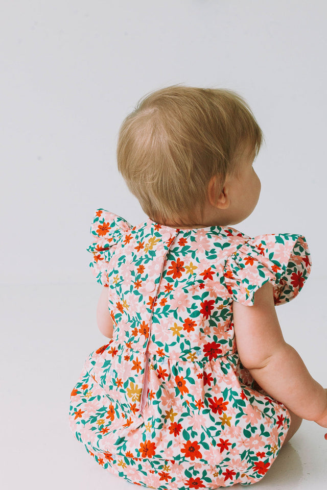infant girls pink red and gold floral bubble romper