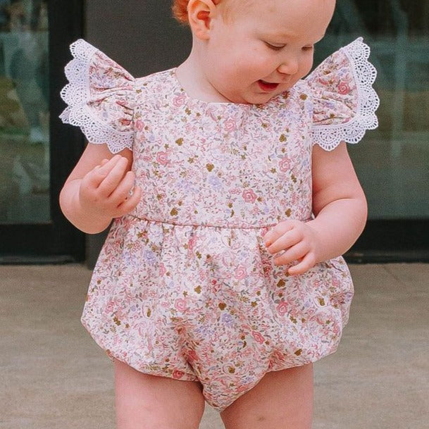 Infant Girl's Pink and White Calico Floral Ruffle Cotton Bubble Romper with Venice Lace Trim