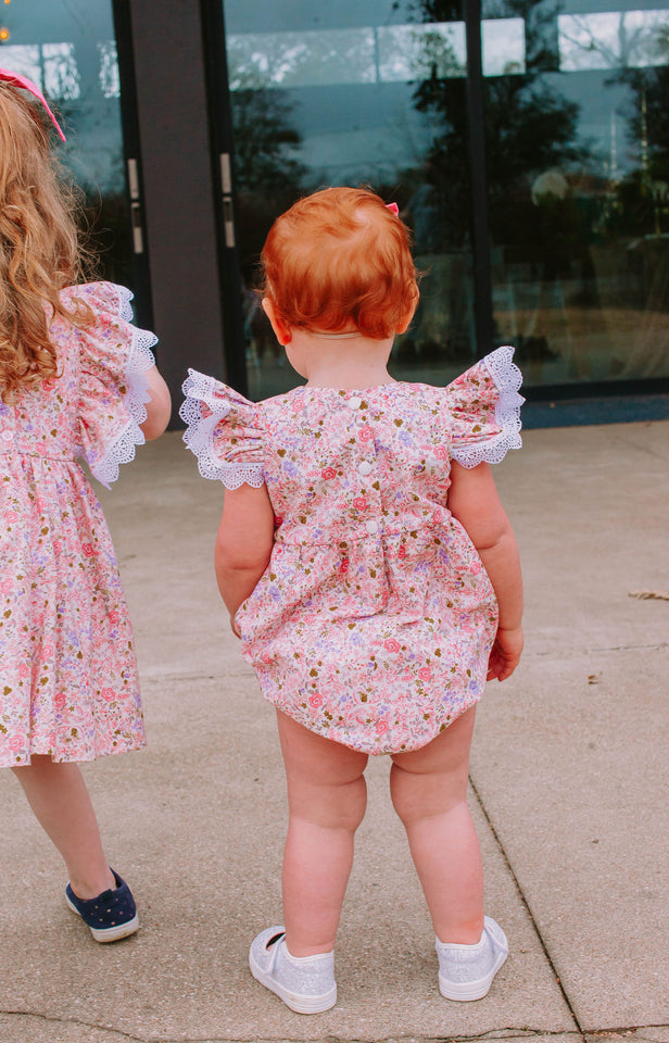 Infant Girl's Pink and White Calico Floral Ruffle Cotton Bubble Romper with Venice Lace Trim