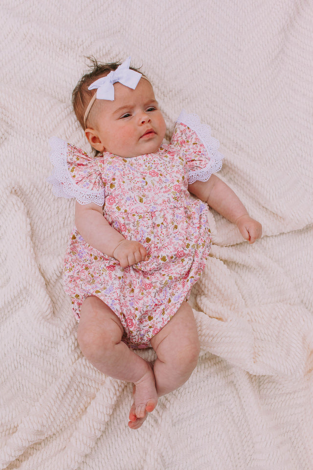 Infant Girl's Pink and White Calico Floral Ruffle Cotton Bubble Romper with Venice Lace Trim