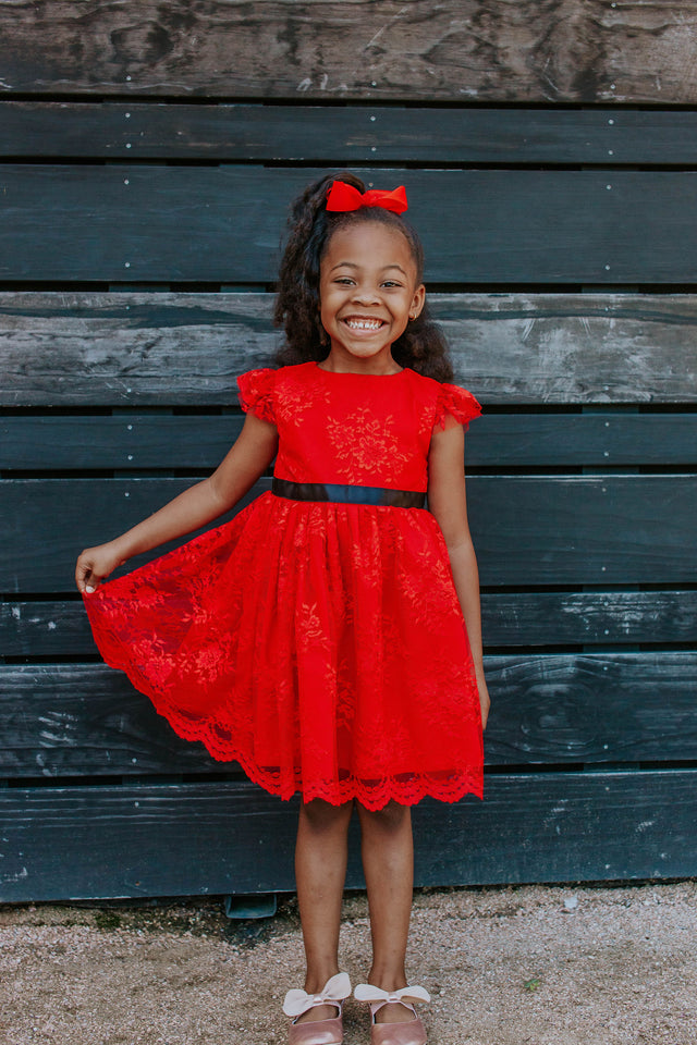 red lace dress with black satin belt