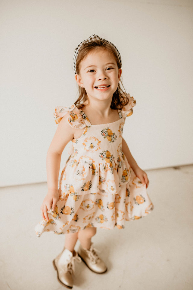 Girl's Bee Print Peplum Twirl Dress