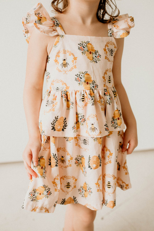Girl's Bee Print Peplum Twirl Dress