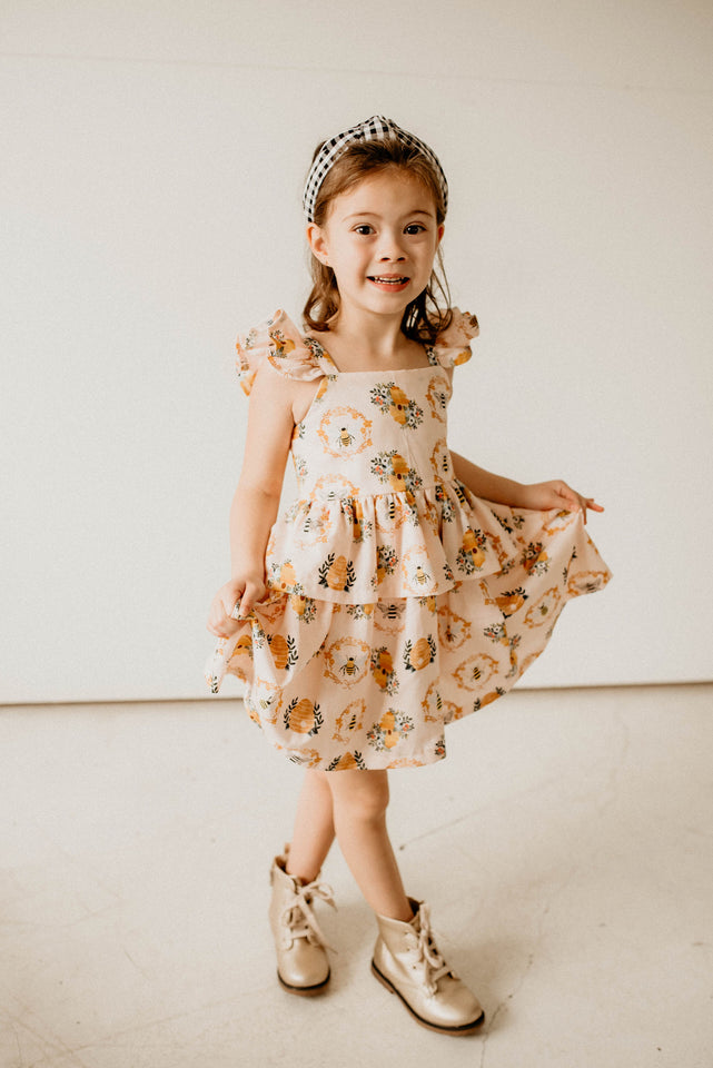 Girl's Bee Print Peplum Twirl Dress