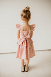 girls pink and white floral twirl dress with peplum skirt