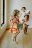 Little Girl's Bright Red and Green Christmas Tartan Ruffle Bib Dress