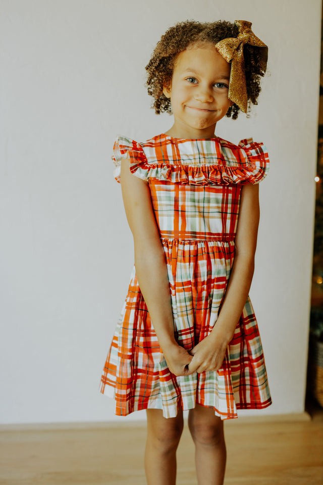 Little Girl's Bright Red and Green Christmas Tartan Ruffle Bib Dress