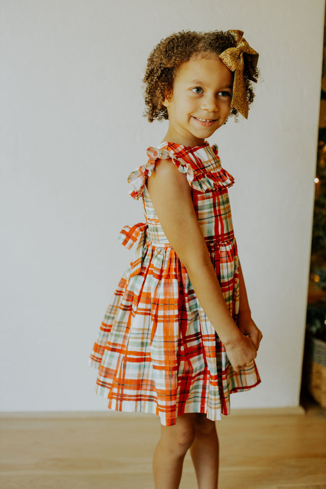 Little Girl's Bright Red and Green Christmas Tartan Ruffle Bib Dress