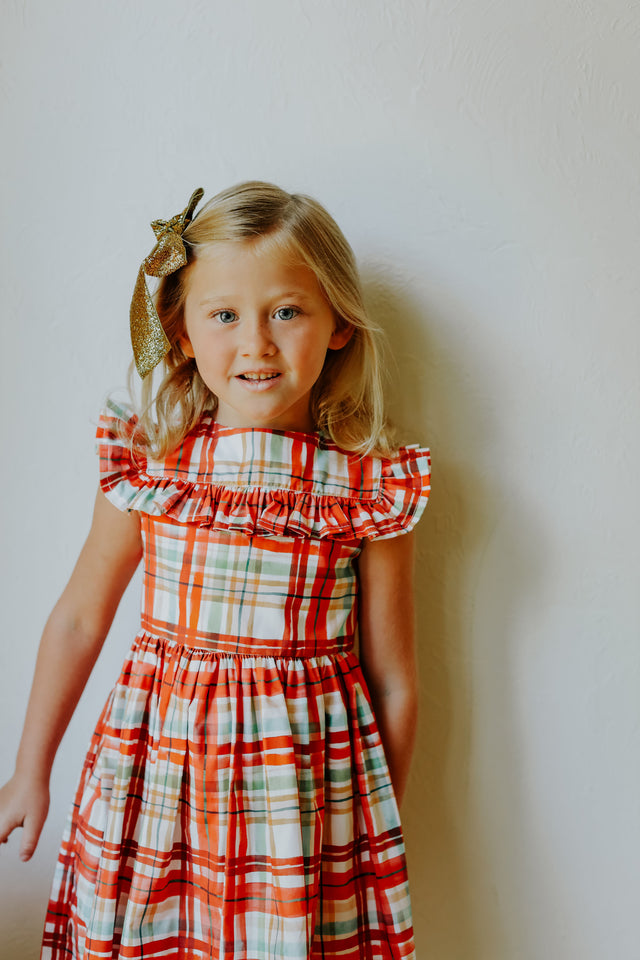 Little Girl's Bright Red and Green Christmas Tartan Ruffle Bib Dress