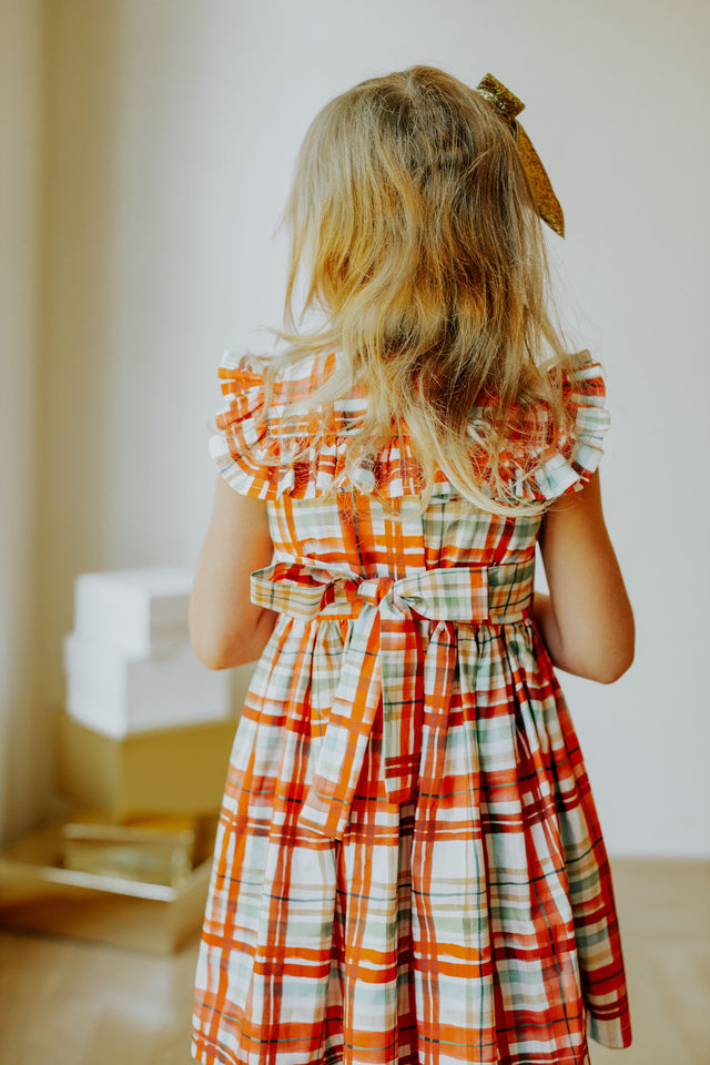 Little Girl's Bright Red and Green Christmas Tartan Ruffle Bib Dress