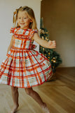 Little Girl's Bright Red and Green Christmas Tartan Ruffle Bib Dress