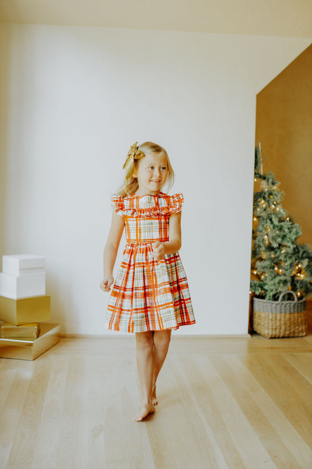 Little Girl's Bright Red and Green Christmas Tartan Ruffle Bib Dress