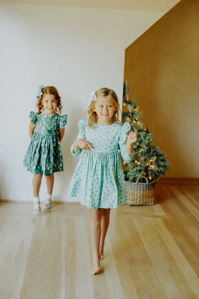 little girls muted hygge tree christmas dress