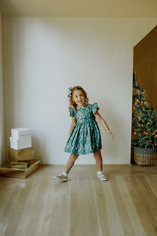 little girls muted hygge tree christmas dress