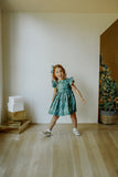 little girls muted hygge tree christmas dress