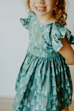 little girls muted hygge tree christmas dress