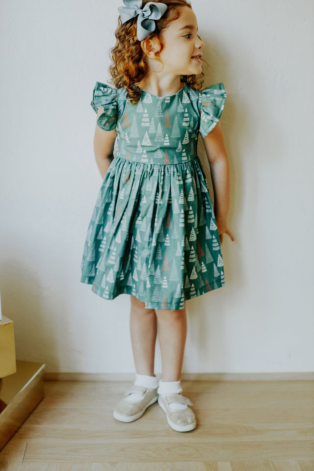 little girls muted hygge tree christmas dress