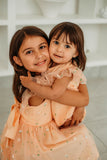 Little Girl's Peach Tulle Daisy Print Twirl Dress