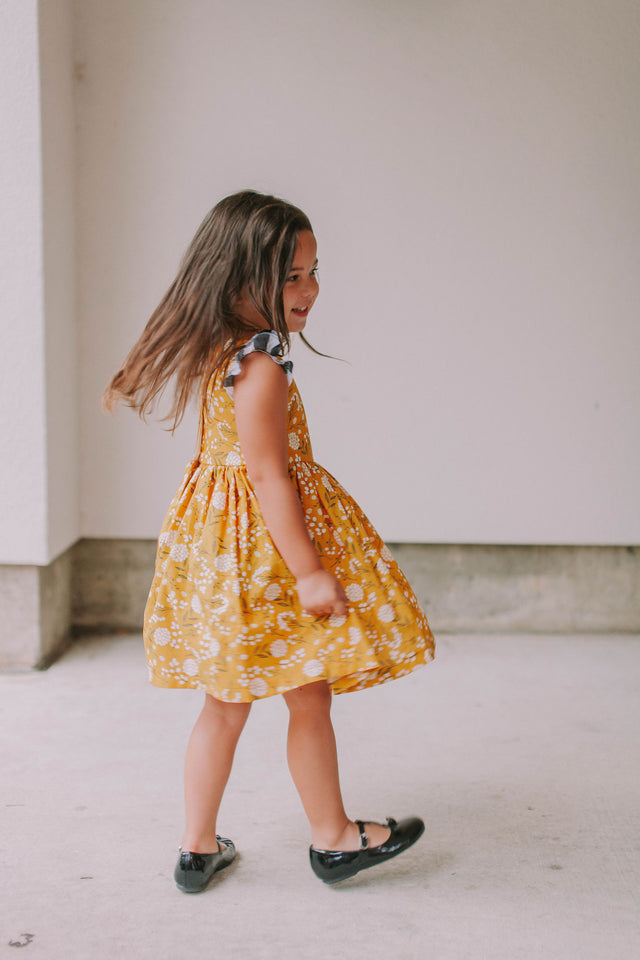 Little Girl's Yellow Floral Twirl Dress with Contrasting Flutter Sleeves